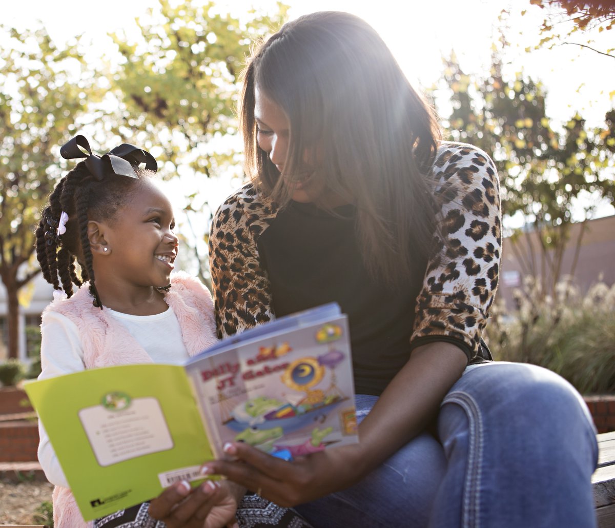 Reading with your child is about much more than reading. Taylor and her mom spend a beautiful day talking and laughing with Dilly and JT Gator.  #investiGators #investiGatorClub