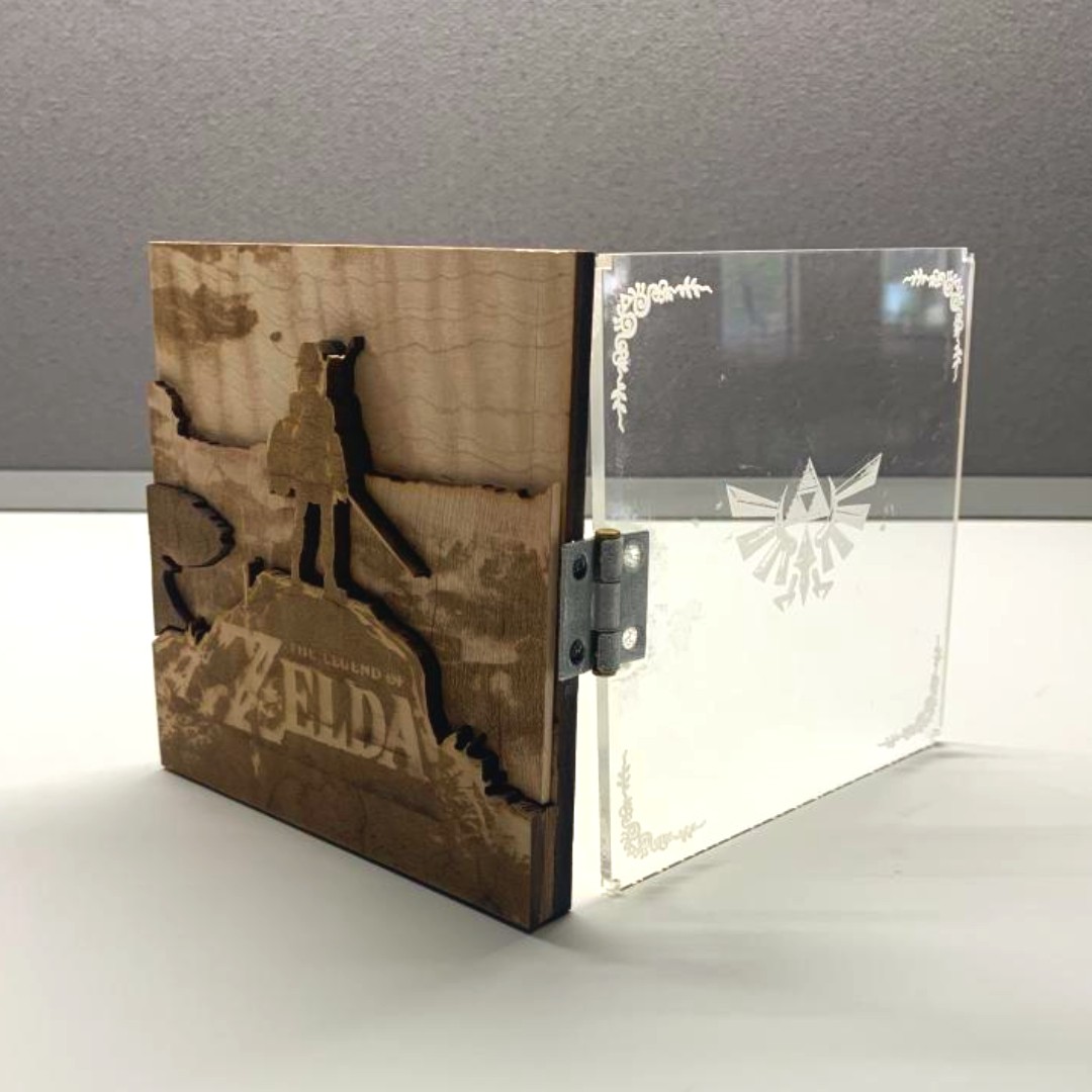 exlab_gsu's tweet photo. look at this INCREDIBLE case made by one of EXLAB's own student assistants! this was created by laser cutting  and engraving layers of acrylic and wood. stop by to find out how to get started! https://t.co/IRomxoZUC7