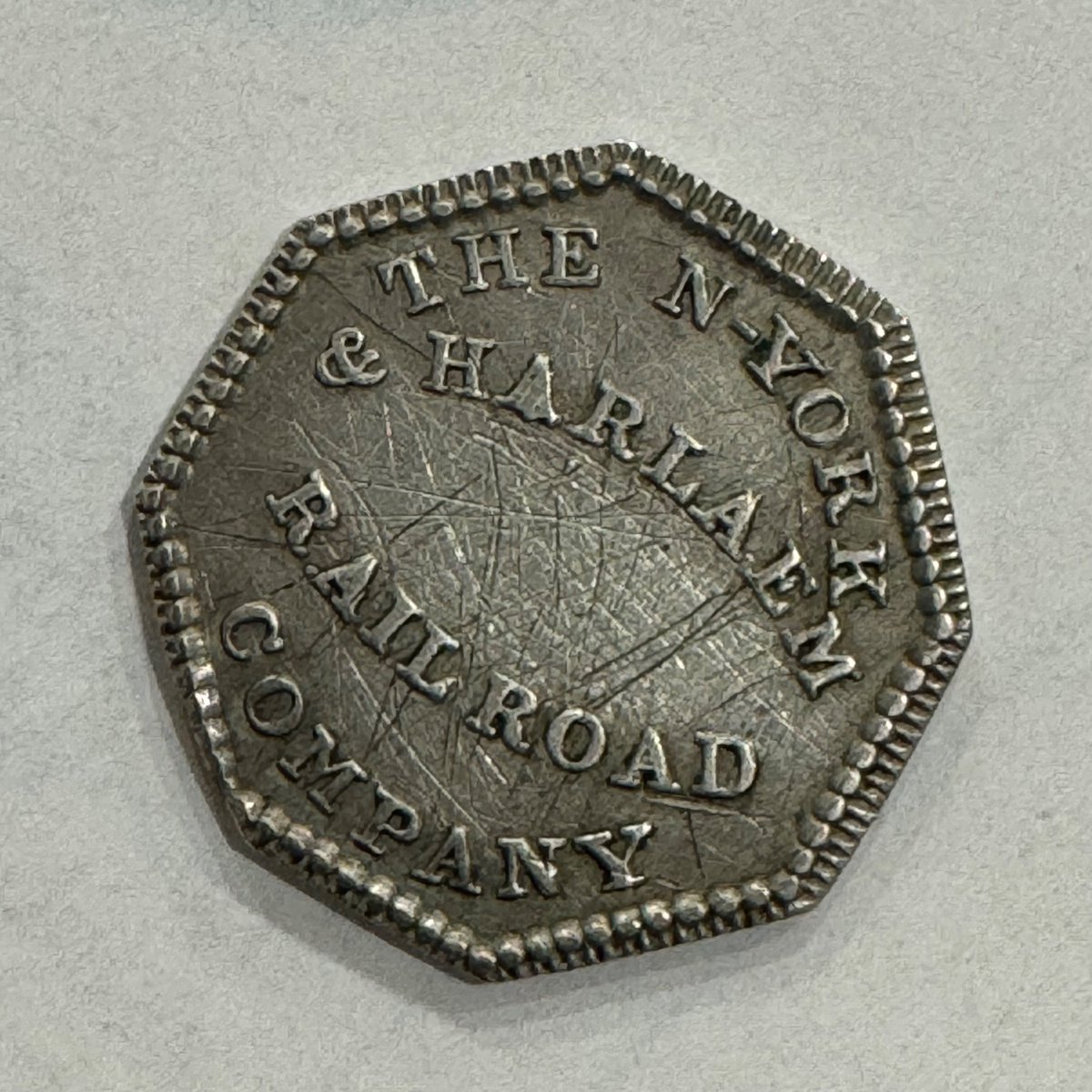 I have finally acquired the white whale of my collection! An 1838 New York and Harlem Railroad token. Such excitement!