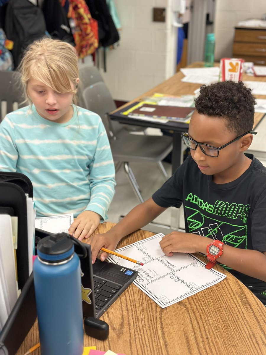 Reading a story with our partner and identifying sensory details in the settings.