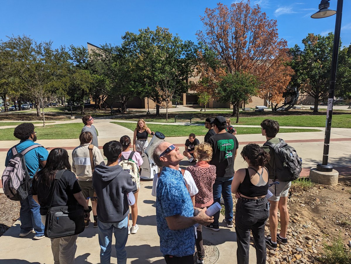 Society of Physics Students officers and our awesome volunteers testing out a telescope with a solar filter - just one of the activities you will find at our Eclipse Viewing Event on October 14. Hope to see you there! physics.unt.edu/news-events/ec…
