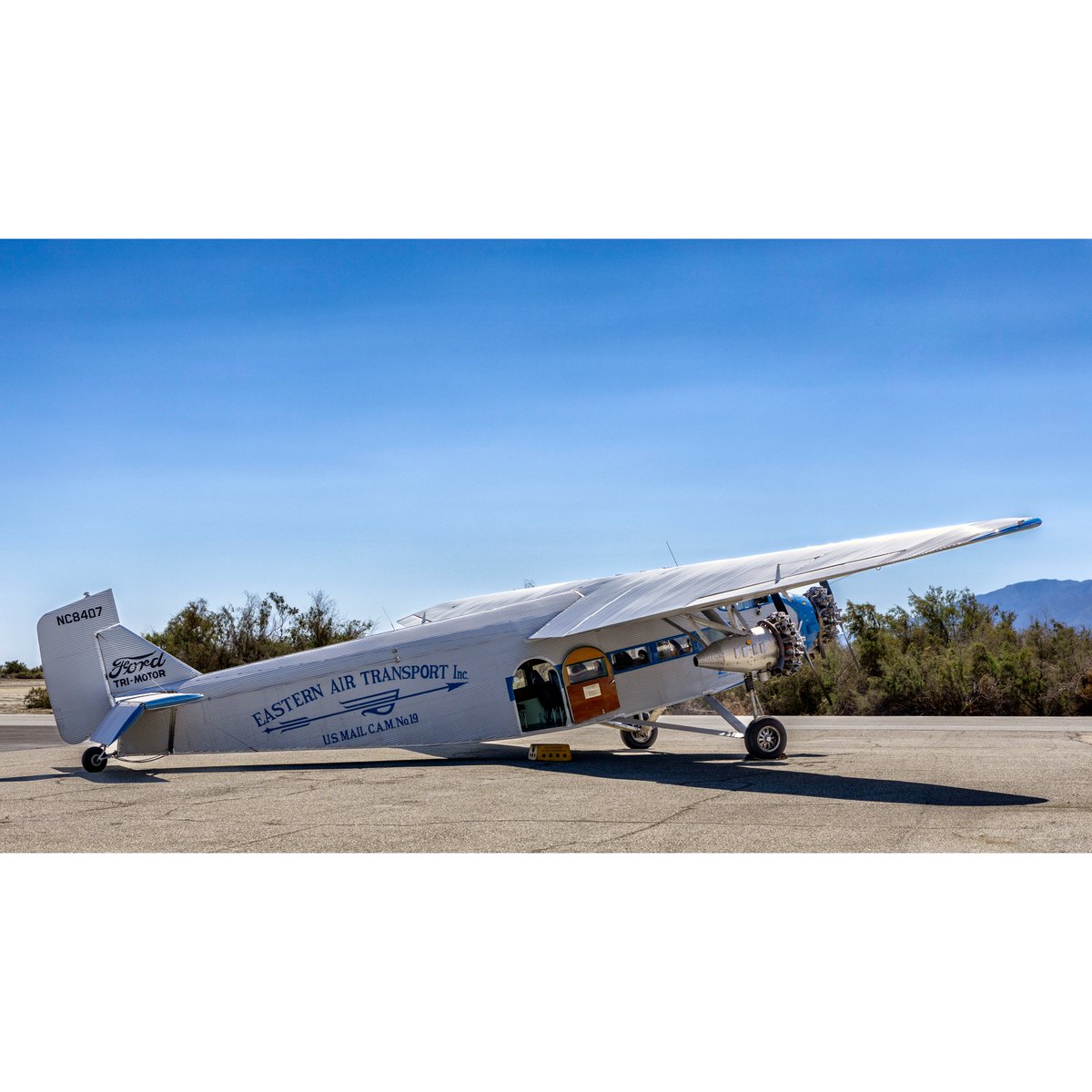 danstiel's tweet photo. Jacqueline Cochran Airport (TRM) is welcoming this beautiful 1929 Ford 4-AT-E #Trimotor aircraft this weekend. This aircraft has a storied history flying passengers across Cuba and Central America. What a treat to photograph. https://t.co/VCjzqChIyk