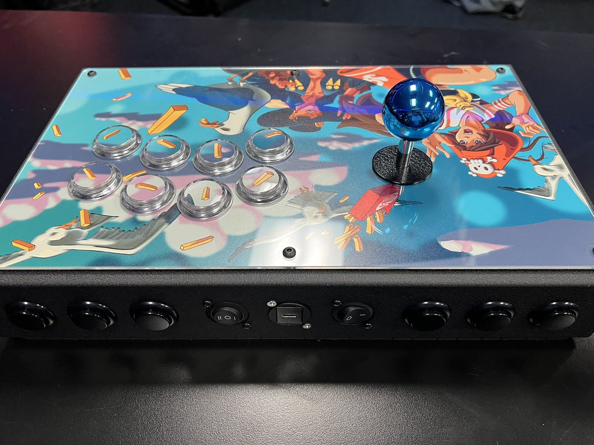 jack_wachter09's tweet photo. Brought out my almost-done new stick to my local. @AllFightSticks 14” enclosure with Noir layout, Sanwa JLX, Crown 30mm buttons, Brooks UFB Fusion. Art is by @_megacomputer

Last thing I need to do is buy the harness for touchpad, R3, and L3 https://t.co/XpqYGCuQte