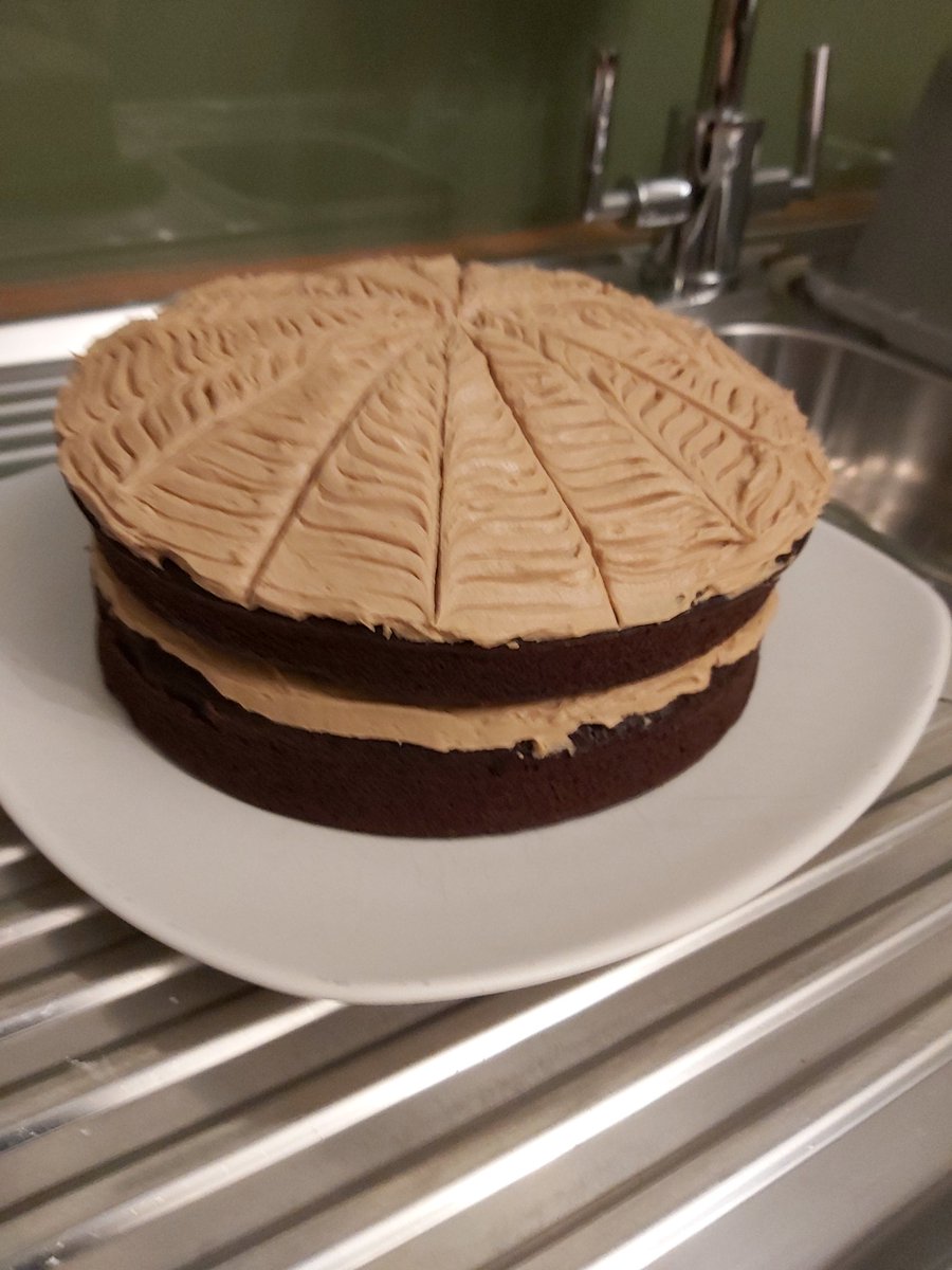 kamfinsa's tweet image. When @Nigella_Lawson made this her #RecipeOfTheDay recently, I wanted to try it (who doesn't love a Chocolate Cake with Coffee Buttercream?)

I had no espresso beans to decorate it, but hopefully I've done Nigella proud. #WeekendBaking