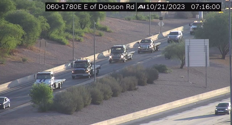 ArizonaDOT's tweet image. HAPPENING NOW : More than 100 tow trucks, including ADOT’s Incident Response Unit trucks sponsored by @GEICO, form a parade that marks National Move Over Day.