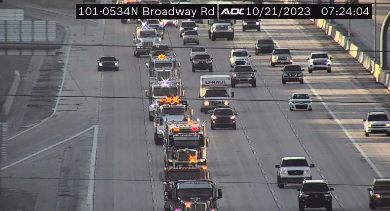 ArizonaDOT's tweet image. HAPPENING NOW : More than 100 tow trucks, including ADOT’s Incident Response Unit trucks sponsored by @GEICO, form a parade that marks National Move Over Day.