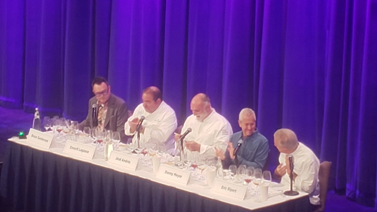 We're updating you live from the Chef's Challenge at #NYWE2023. It's @BSandersonWine vs. @chefjoseandres, @ericripert, @Emeril and @dhmeyer in a #wine-and-food pairing challenge! Who will win? The @WineSpectator senior editor or the #chefs? You'll have to wait and see ...