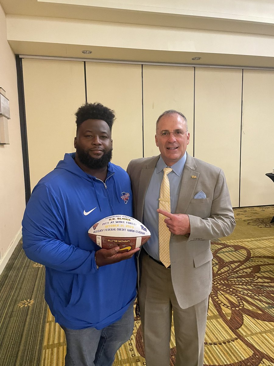 SEisbergWCIV's tweet photo. How cool. Big win last night for James Island, today, their defensive coordinator Horatio Blades (still wearing his JI Trojans jacket) an honorary captain for his alma mater- the Pitt Panthers. https://t.co/D1ef72ItXe