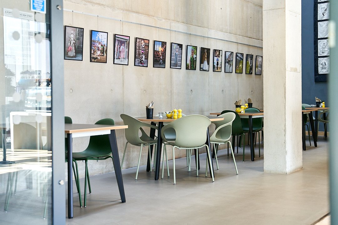 OpenEyeGallery's tweet image. A Portrait Of The High Street #Prescot is part of our current exhibition. It's also on display  in the @ShakespeareNP cafe area and on Eccleston Str. It's essential for the local community to see themselves represented and to see the photos exhibited in the place where they live!