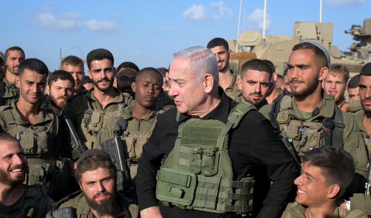 IsraeliPM's tweet photo. Prime Minister Benjamin Netanyahu met with soldiers from the IDF Golani Brigade 51st Battalion at an assembly point near Gaza. 

"I am here with Golani soldiers from all parts of the country. They have fought like lions and will fight like lions." https://t.co/ZsdR9wpkEO