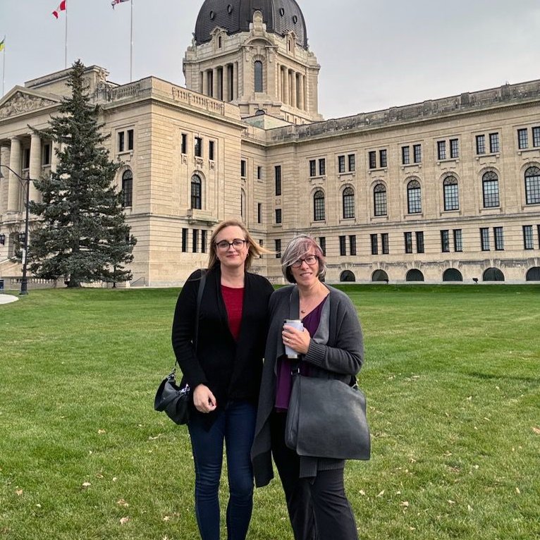 UofRFA's tweet photo. This week, URFA President @brittdhall accompanied Gwen Grinyer to the Legislature as her impact statement was read during the Notwithstanding bill debate. It's important that we stand together against this government's move to violate the Charter rights of 2SLGBTQ+ students. https://t.co/btLFzBMB3B