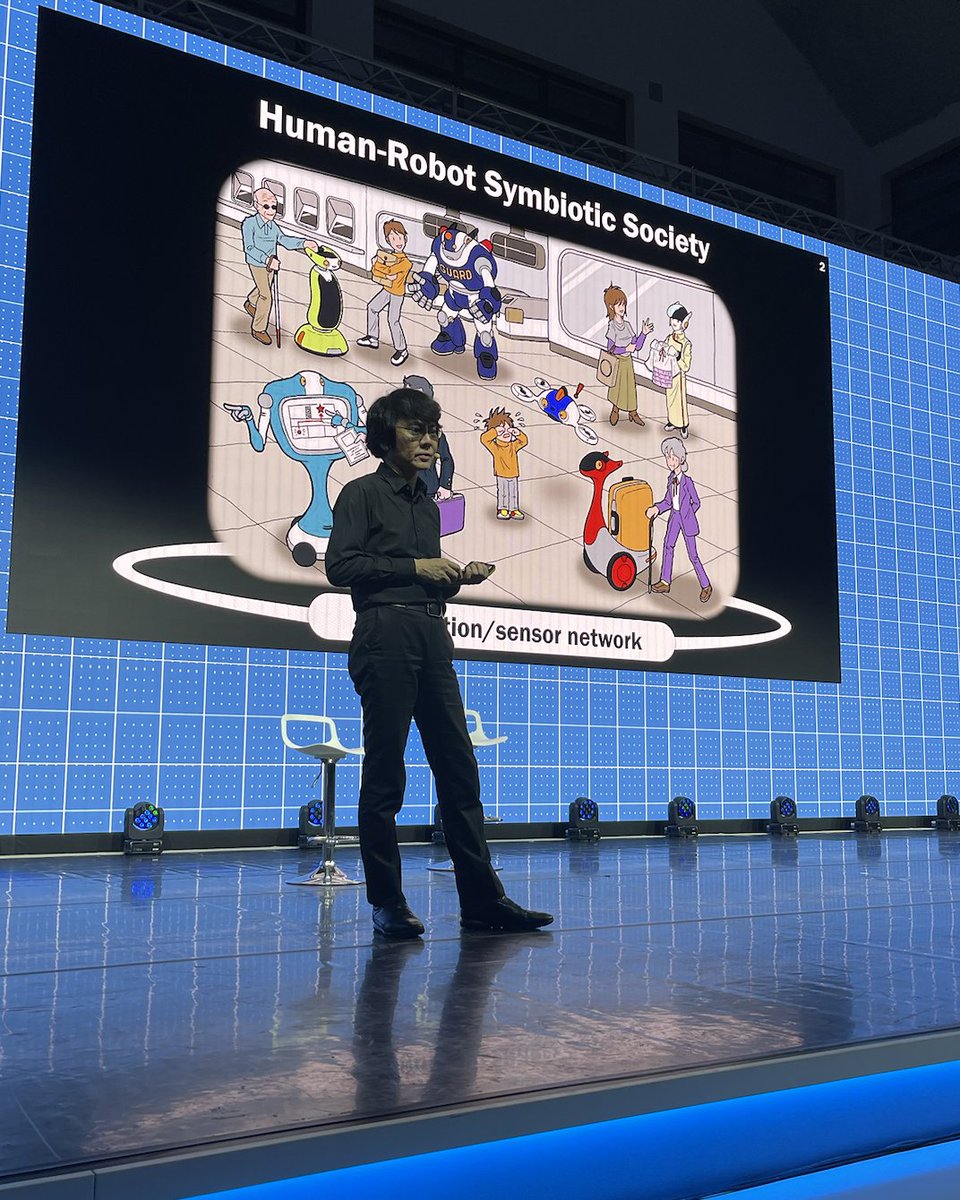 MakerFaireRome's tweet photo. "Che tipo di mondo vogliamo creare? Se usiamo avatar nel mondo reale, possiamo combinare tutto quello che esiste nel mondo reale con quello che esiste nel mondo digitale quindi effettivamente raggiungere l'inclusione" Sul palco della #OpeningConference #MFR2023 Hiroshi Ishiguro, padre della robotica geminoide  professore al dipartimento di macchine adattive all'Università di Osaka che ha raccontato le ultime frontiere della #robotica e intelligenza artificiale #AI