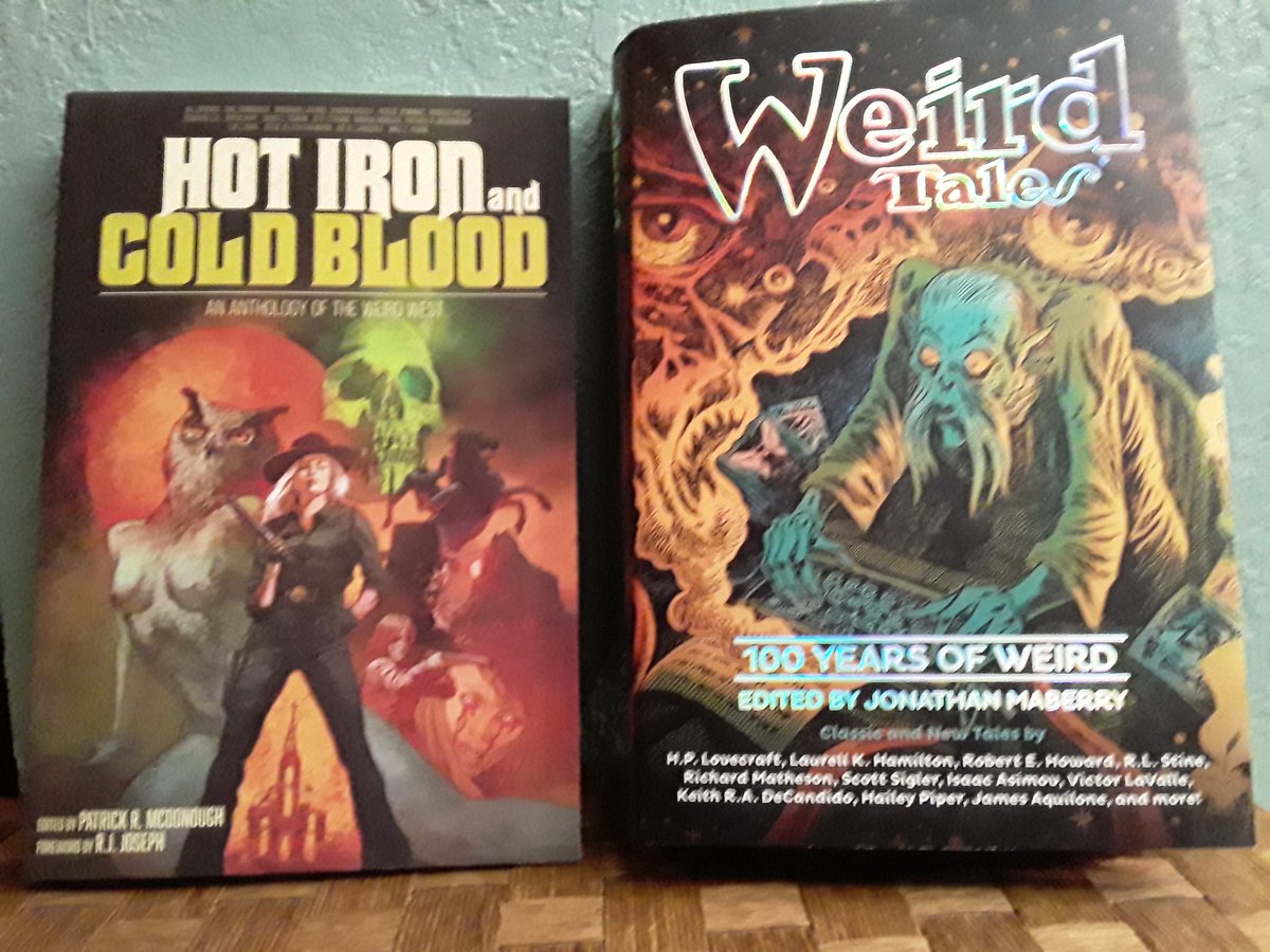 The UPS driver outdid himself today delivering contributor copies of two beautiful anthologies.  I am very honored to be included in these books. Now, the hard part is deciding which book to read first.