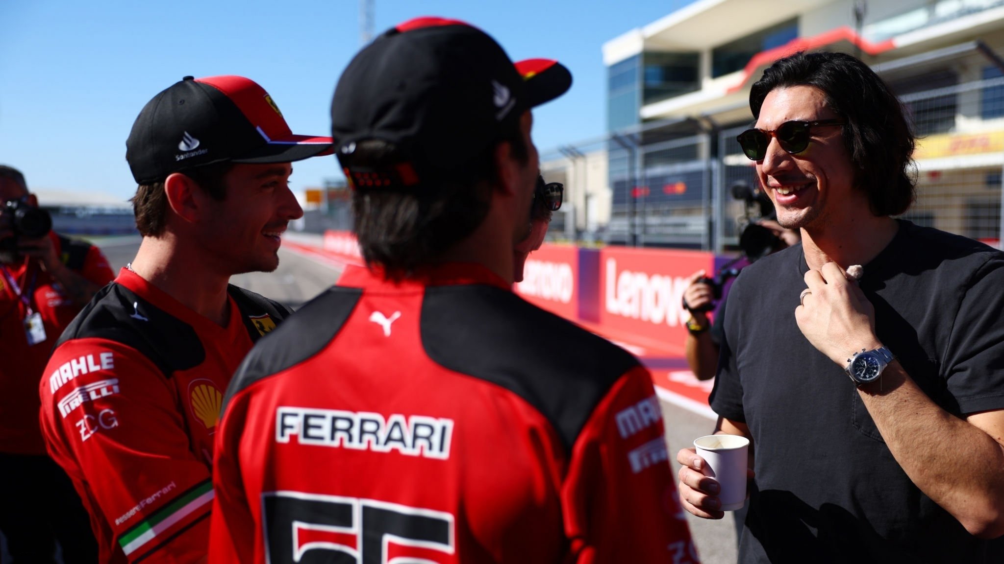 Charles Leclerc and Carlos Sainz meeting Adam Driver and Michael Mann