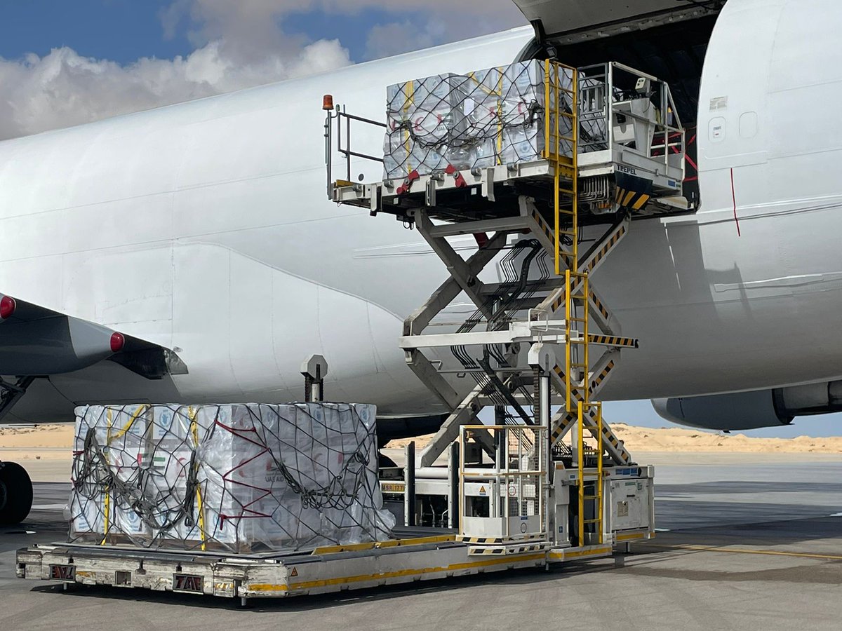 WHOoPt's tweet photo. Another plane carrying @WHO medical supplies has landed at Al Arish airport, Egypt thanks to the support of the United Arab Emirates.
  
Supplies are enough to cover 1000 medical operations, and include tents and water tanks. 

Aid supplies are piling up in Al Arish -  just 20 minutes from Rafah. Humanitarian partners are ready to deploy but cannot move until Rafah opens. 

WHO calls for immediate, unimpeded and sustained humanitarian access, including through Rafah.