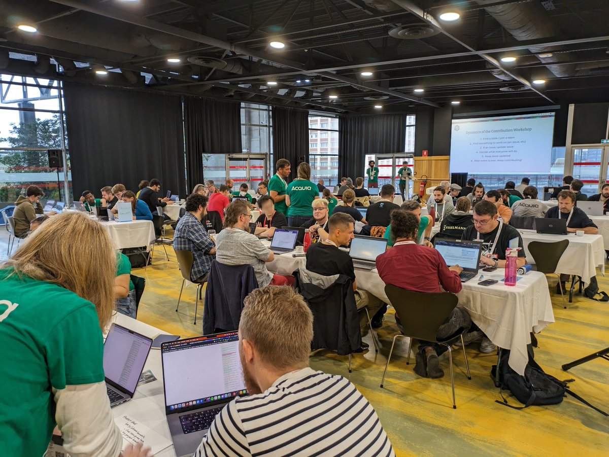 gaborhojtsy's tweet photo. Final day at @DrupalConEur! The first time contributor workshop is full with mentors helping folks get to know the tools and process, while the general contribution room is buzzing with tables working on admin UX, https://t.co/bYWlawyxAk, decoupled Drupal, recipes and a lot more. https://t.co/U9agKbhTuq