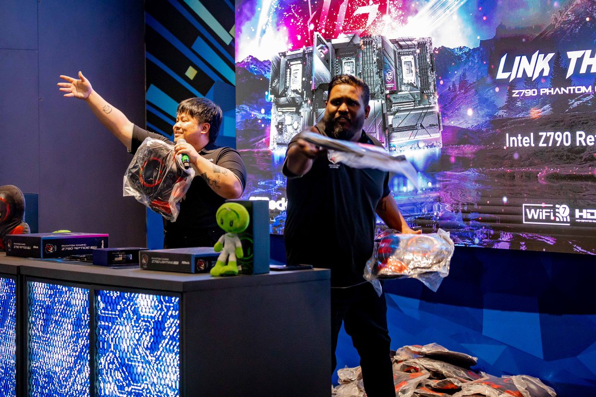 PRGalleria's tweet photo. Who made it down to @sxswsydney this week? Our @GroundZeroOCE  hosts @SonnyMovement and @pavlovaface kicked off the Tech &amp; Innovation Expo with a bang, introducing ASRock’s new Phantom Gaming Z790 motherboard refresh! Did someone say freebies? 🤩#SXSWSydney #ASRock https://t.co/bJZEJenENs