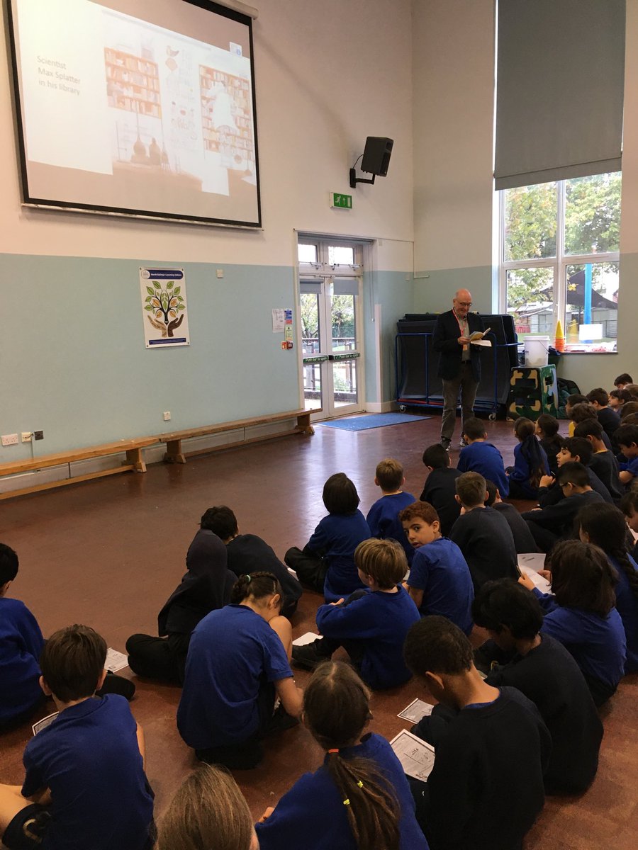Visit from a local author Cliff Martin talking to the children about his book-‘Help Children have taken over the world’.
