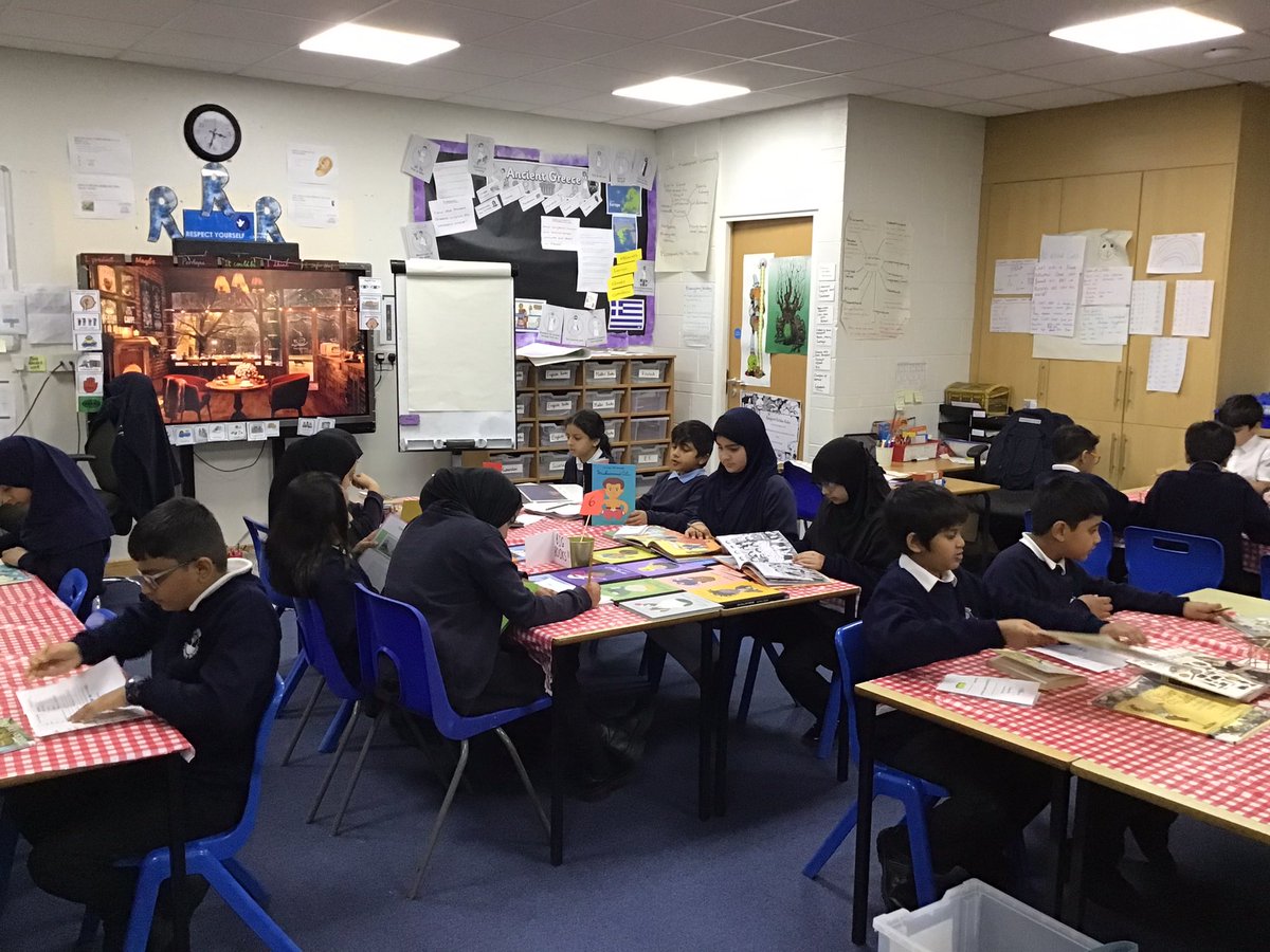 Primary_StJohns's tweet photo. 5A reading cafe.  We filled in our reading cafe menus as we moved around the stations whilst listening to ambient music.#SJCreader https://t.co/mLNIIHzoGw