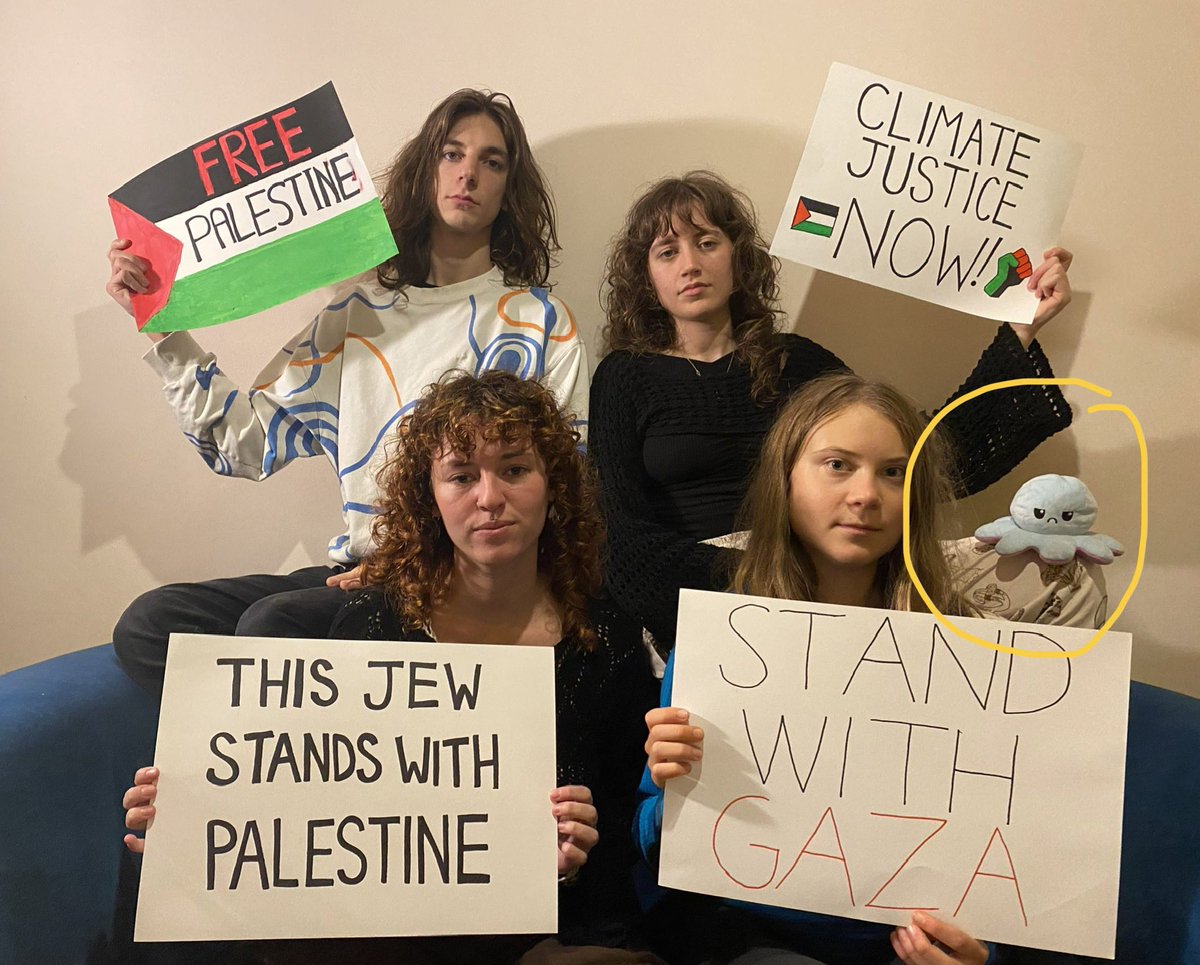 Imamofpeace's tweet photo. Was this octopus plush placed on her knee at the wrong place and wrong time, or are they conveying another message? https://t.co/0o8kbm5bNV