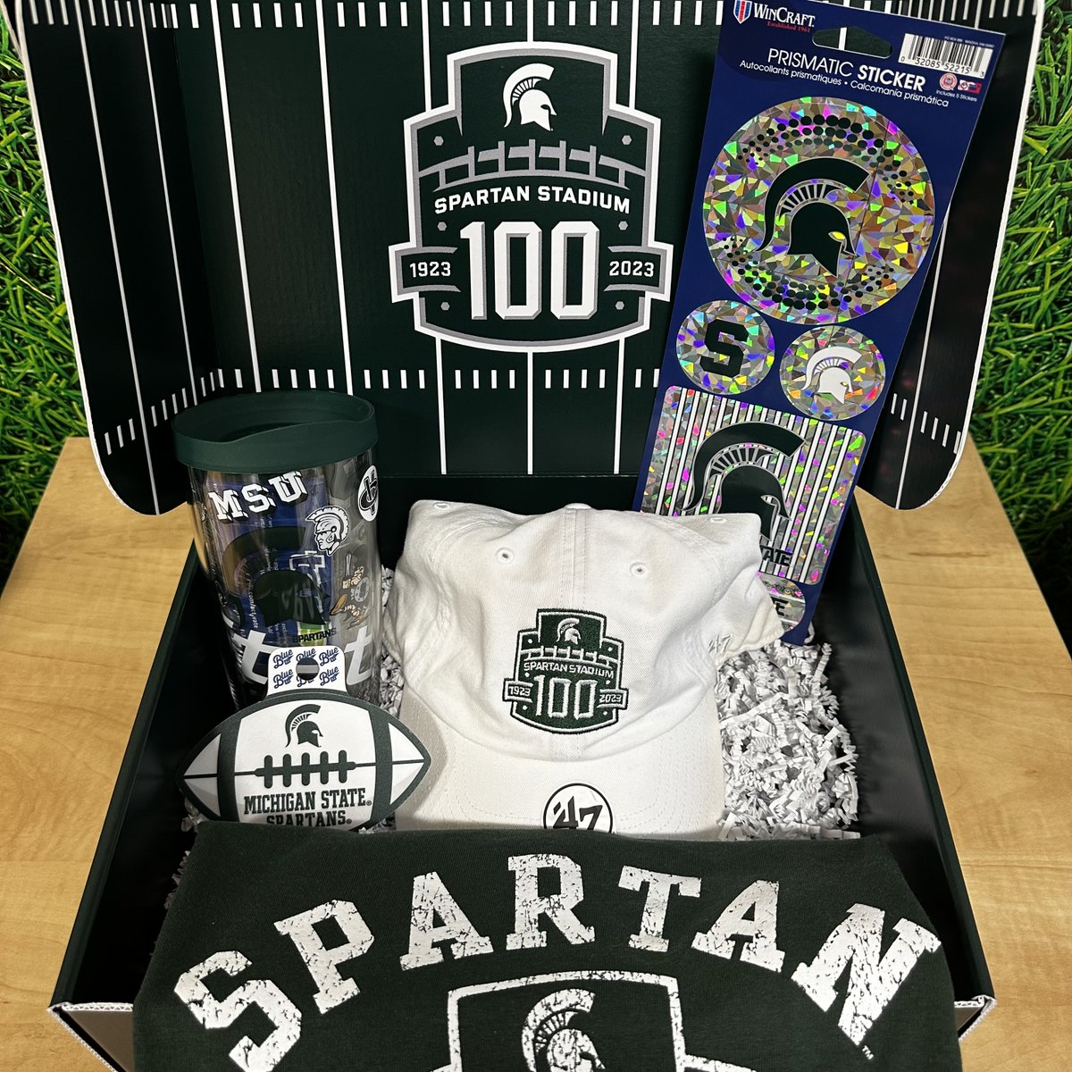 MSUGear's tweet photo. We're back with Spartan Stadium Trivia! For your chance to win the awesome prize pack pictured below:
• Follow @MSUGear 
• Repost this post
• Correctly answer the following... Regardless of the weather, what does the PA announcer say each home game?

Winner announced 10/23 https://t.co/8GxjSINnAd