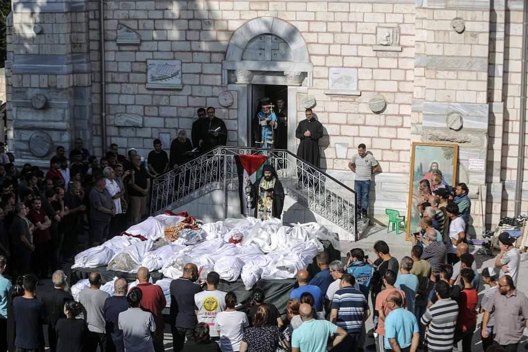 wafa_Gaza's tweet photo. 18 Christian Palestinians have been murdered today after the Israeli warplanes bombed a historic church in Gaza city.
#GazaUnderAttack https://t.co/UAj3ZzHf5p