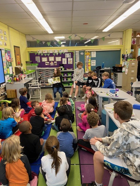 Building school community - 8th gr. students teach traditional Malagasy dance to 2nd gr. students while others teach 1st gr. students about deforestation.