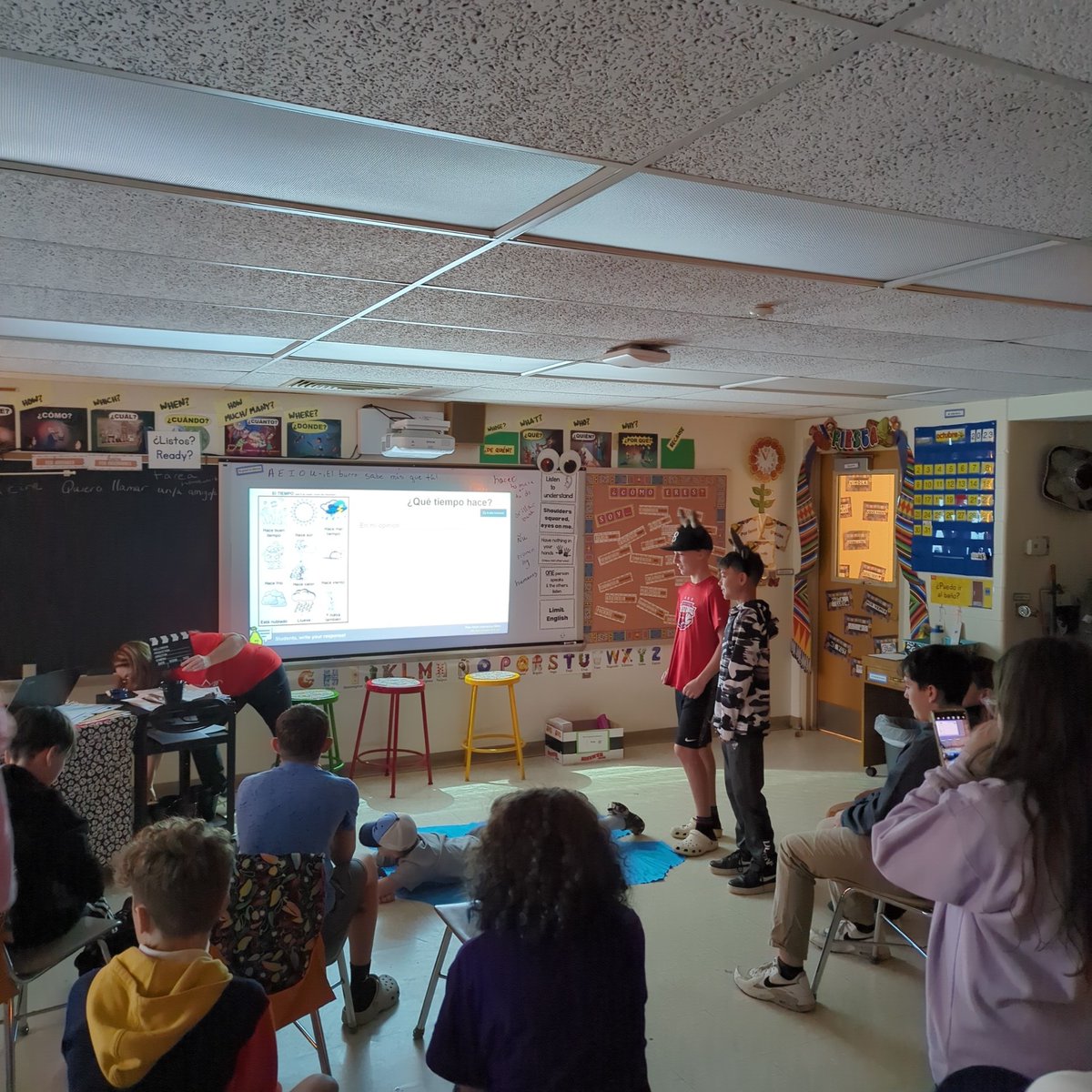 Students acting out scenes from Ferdinand in Espanol Class.