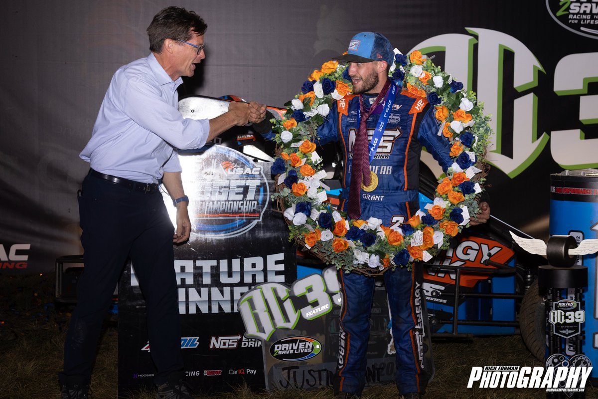 We have often thought that Doug Boles would give the shirt off his back for dirt open wheel racing.  Well after Justin Grant won this years BC39 Doug gave him the tie from around his neck.  Thank you Doug for being a champion for dirt open wheel racing.