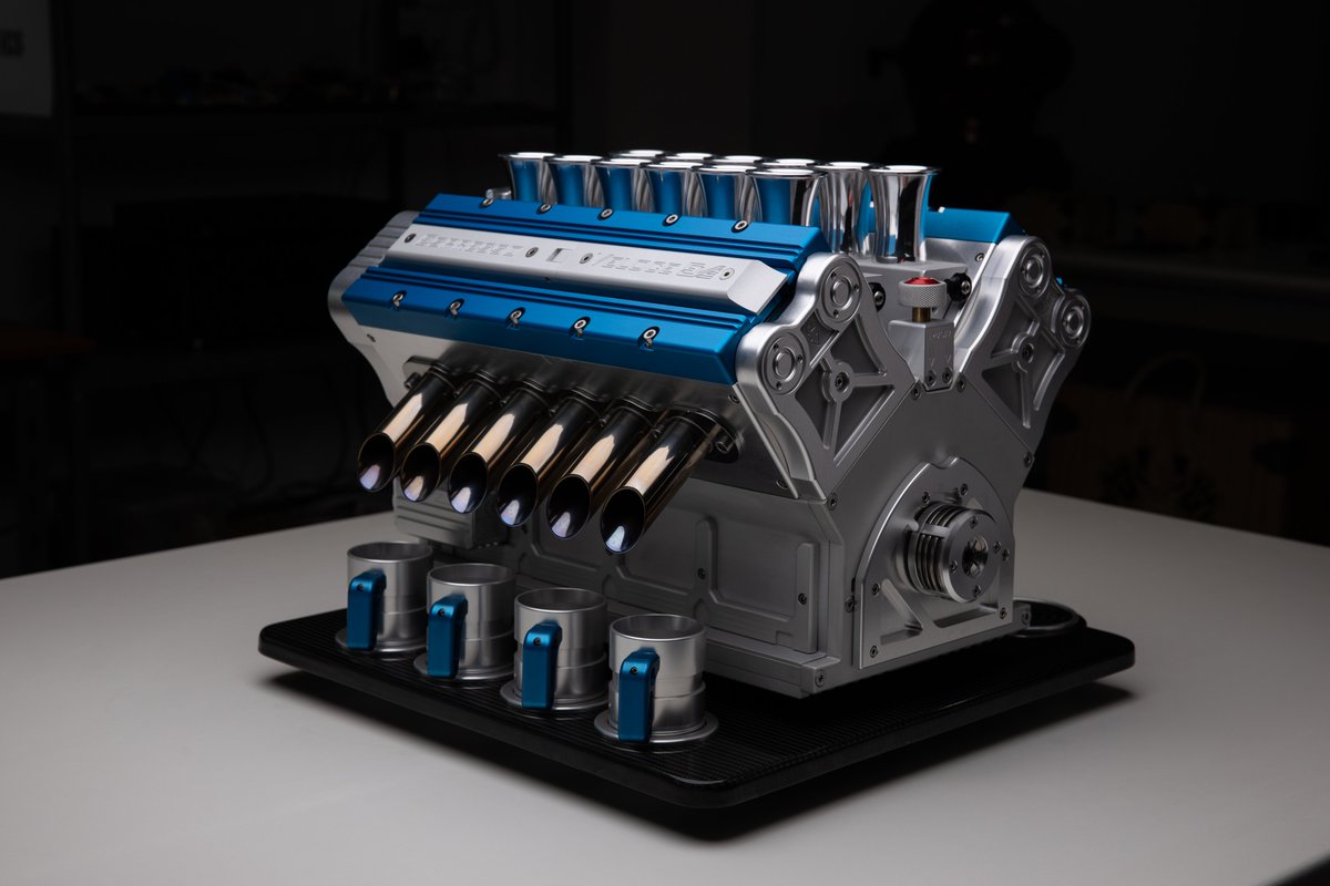 SuperVeloceCo's tweet photo. Sipping the finest fuel from our V12 engine-inspired coffee machine, crafted from materials such as titanium and carbon fiber! This marvel of engineering not only brews the perfect cup, but also serves as a stunning centerpiece in any home or office. https://t.co/mGvPkhGSNi