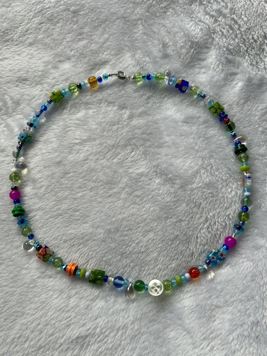 webkinzsnail's tweet photo. i made a necklace :] https://t.co/pSiWYiQQ7Y