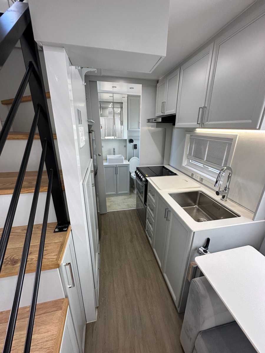 WilderwiseHomes's tweet photo. Staircase spotlight! 🔦 Many design improvements have made our #staircase one of the most functional AND beautiful features of the tiny home. Colors are customizable and of course, there's storage under every step 😁 #twostory #tinyhome #tinyhouse #glamping #affordablehousing https://t.co/8ECVR9Unke