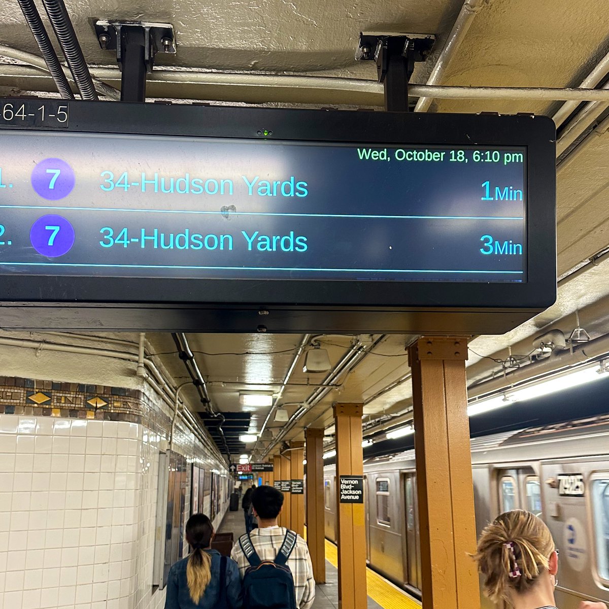 A 7 train is at the station, while two more are set to arrive within 3 minutes. This is why the 7 is the greatest subway line in North America.