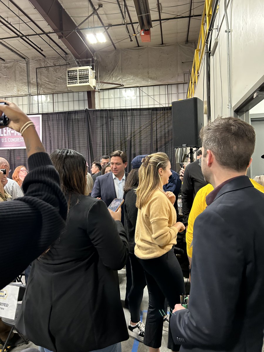 DIpolitics's tweet photo. @millermeeks @TheDailyIowan @RonDeSantis visits with voters ahead of the event. https://t.co/2zafFBwQJh