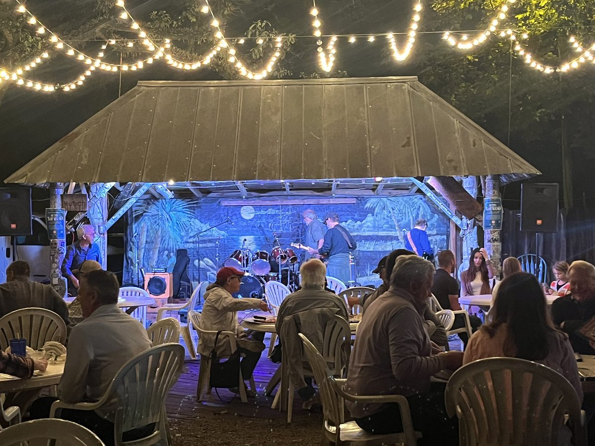Emmybee_CA's tweet photo. After dinner decided to stop by an old stomping ground (pawleys island tavern)  and discovered an old gd cover band I haven’t seen in 20 years is playing. ✌️🌹💀#TheMullets https://t.co/UMMyQX4l2b