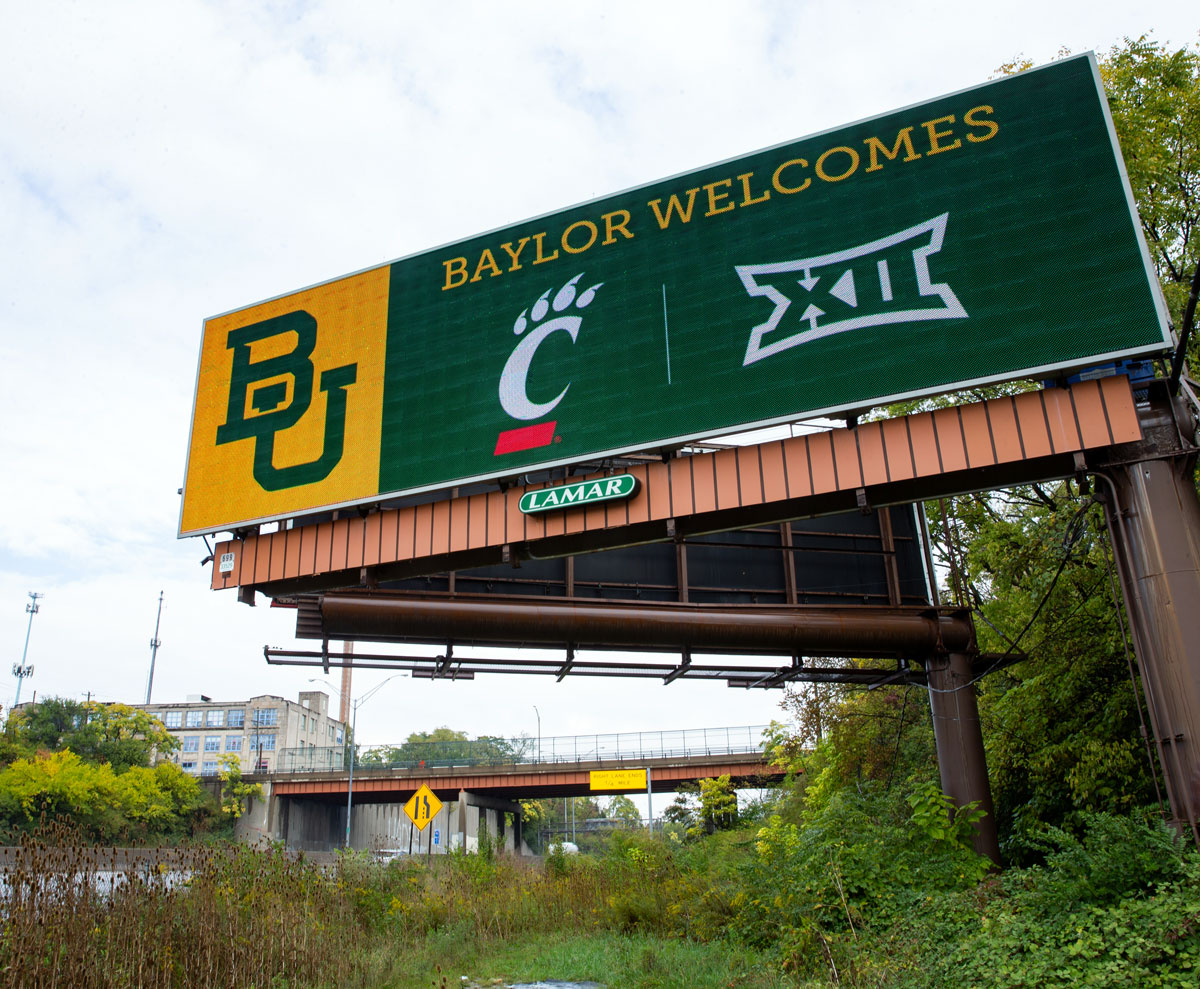 Welcome to the <a href="/Big12Conference/">Big 12 Conference</a>, @UofCincy! 🐻🤝🐾

These billboards are running across Cincinnati this weekend before the Bears' &amp; Bearcats' first game as conference foes.
