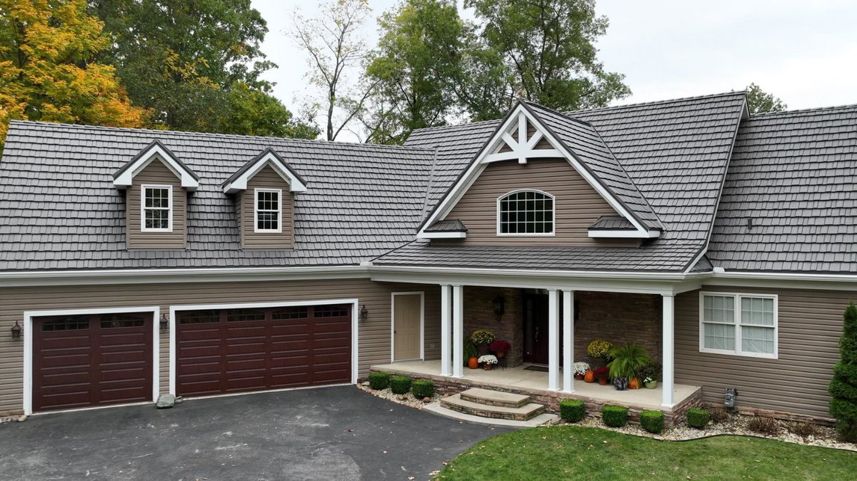 The beauty of Country Manor Shake never ceases to amaze us! We transformed this home adding a gorgeous custom front &amp; back gable bracket which highlights the superior craftsmanship we provide to our homeowners!