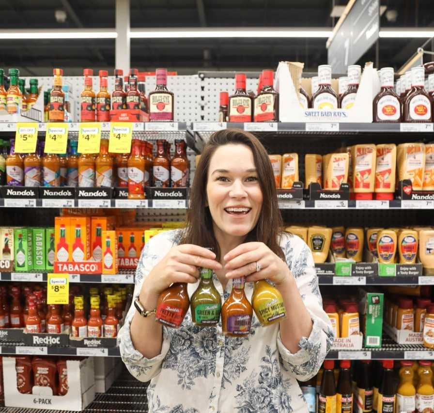 Here's a photo of me cackling "my precious" like a witch IN WOOLWORTHS!!! Yeah that's right baby, Bunsters finally kicked in their door and we're now in every Woolies in WA. So get in there and grab a bottle of Original, Green and Gold, Spicy Mustard (new name for Salami sauce),