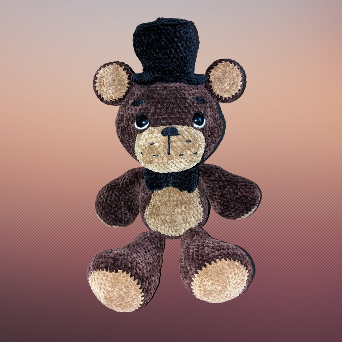 MandaPandaCraft's tweet photo. With the FNAF movie coming out  in 1 week, I felt it was appropriate to release this cutie! Run to get yours!

#freddy #fnaf #fivenightsatfreddys #fazbear #freddyfazbear #crochet #crocheter #crochetersoftexas #smallbusiness #yarn #crocheting #craft #crafter #fiber #fiberartist https://t.co/gpAqZpRQuk