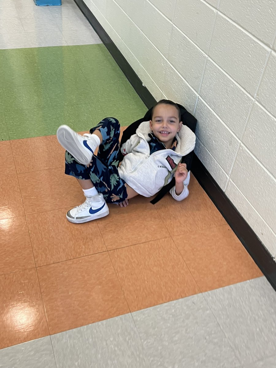 SpEd_MrsZugg's tweet photo. When it’s PJ day &amp; dismissal is taking too long so you decide the hallway is the perfect place to lounge 😴🦀💙 #lovemykids #CCPS #pajamaday #unity #spiritweek https://t.co/hPWBJeR6J6