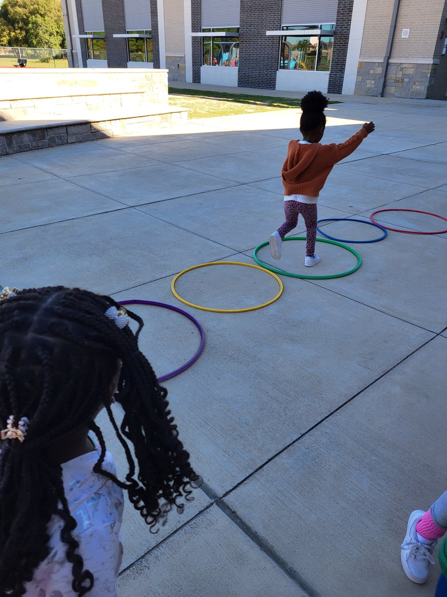 PreK decided to be creative while working on their gross motor skills with hula hoops. #
