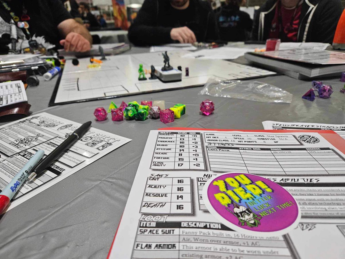 I actually managed to play a game at #gameholecon after the dealer hall closed. @neonlordsrpg is brutal, gonzo fun and Janelle and I were honored to have died glorious and gruesome deaths at the hands of the creator, Brian Shutter.