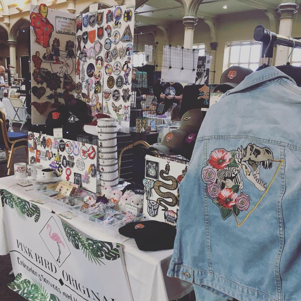 PinkBird_Tweets's tweet photo. This came up on my memories, one of my earlier comic con stalls vs now. All set up for Liverpool Comic Con https://t.co/AKSfn3VgSK
