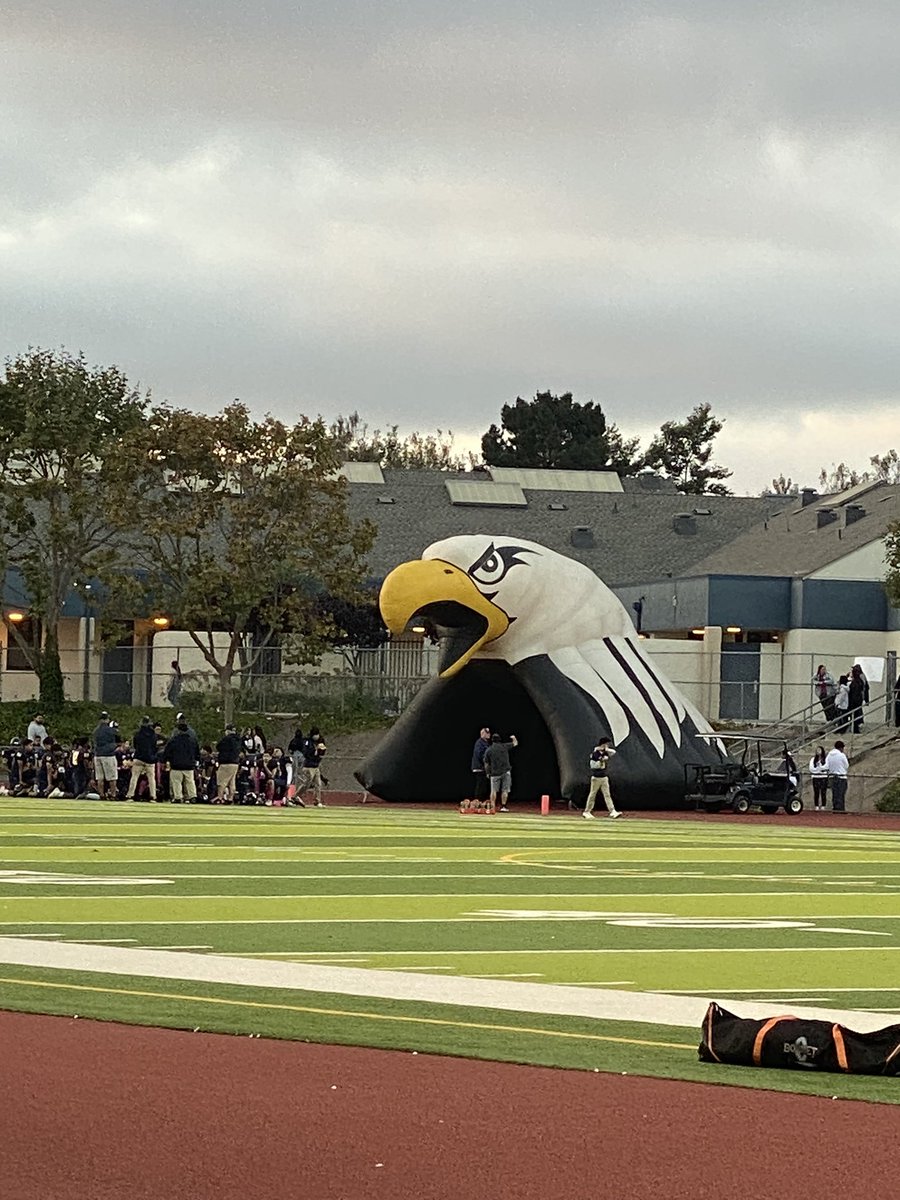 Sdeyoung1's tweet photo. At our pink game. I worked all night in the concession stand. Had a student ask me to take a photo with him. They made the balloon arch. Long but fun night. #pinkgame #football #EAHS #BreastCancerAwareness https://t.co/X5NLeS1l3r