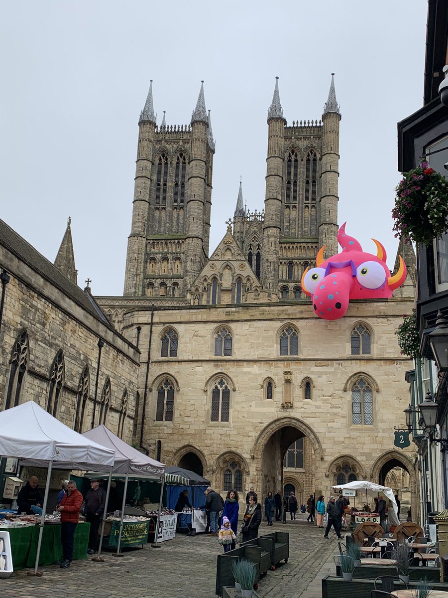 A pink dragon has taken up residence at Exchequer Gate in Lincoln #medieval