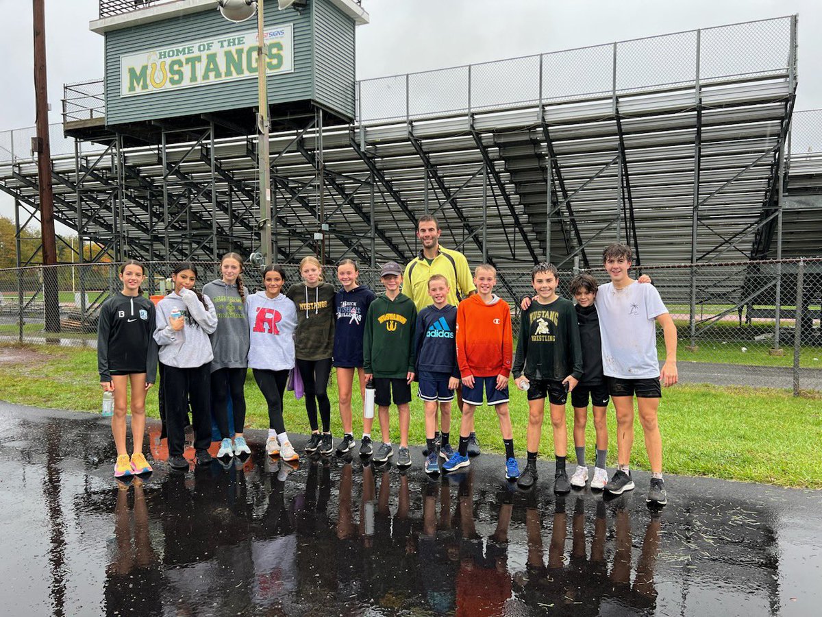 StangsCoachH's tweet photo. A little rain didn’t stop this group from a Saturday morning track workout. Getting ready for Tuesday! #runlikeamustang @VMMSMustangs @VMMSathletics https://t.co/jYp7KZvkhv