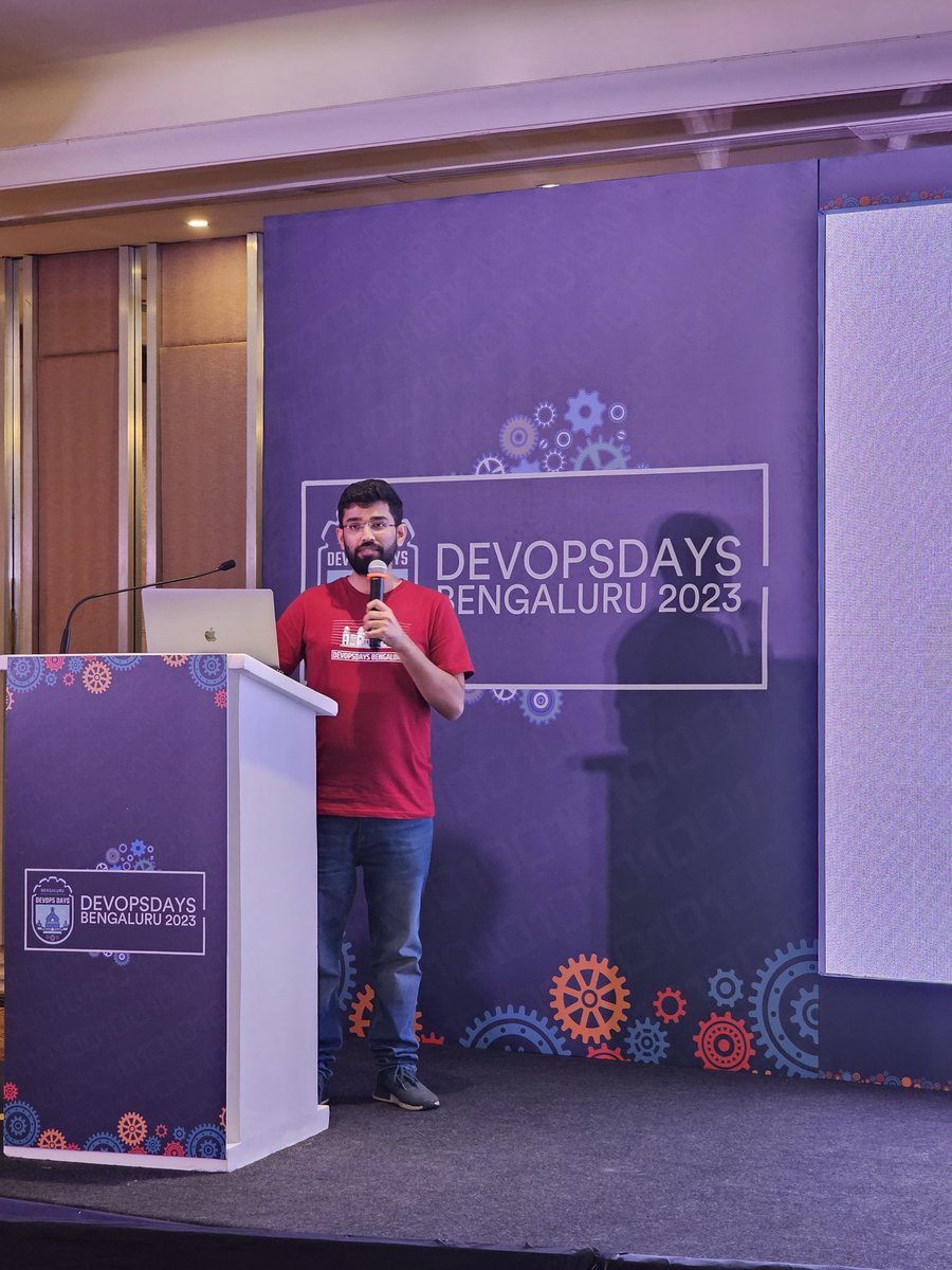 devopsdays_blr's tweet photo. So it is the end.....@vjdhama is on stage with closing note 🔥 Thank you everyone for joining us, for wonderful discussions, Thank you to our sponsors, organisers, volunteers, audience for making these event possible 🫶 https://t.co/QGTq48I4Pc