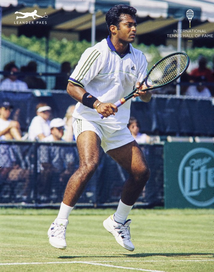 Leander's tweet photo. Levitating at the International Tennis Hall of Fame.
@TennisHalloFame

#PaesForHallofFame #ITHF #Throwback https://t.co/NNmaiJKMKY