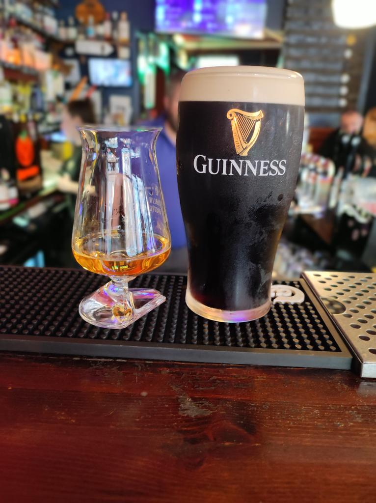 A beautiful pairing if I may say so myself. On the left the highly anticipated <a href="/ThomondGW/">Thomond Gate Limerick Whiskey</a> "clash of the ash" and of course the nectar of the gods, a pint of <a href="/GuinnessIreland/">Guinness Ireland</a> . A lovely soft Monday evening for me here in <a href="/mothermacspub/">Mother Macs (Limerick, Ireland)</a> ☺️🍻.