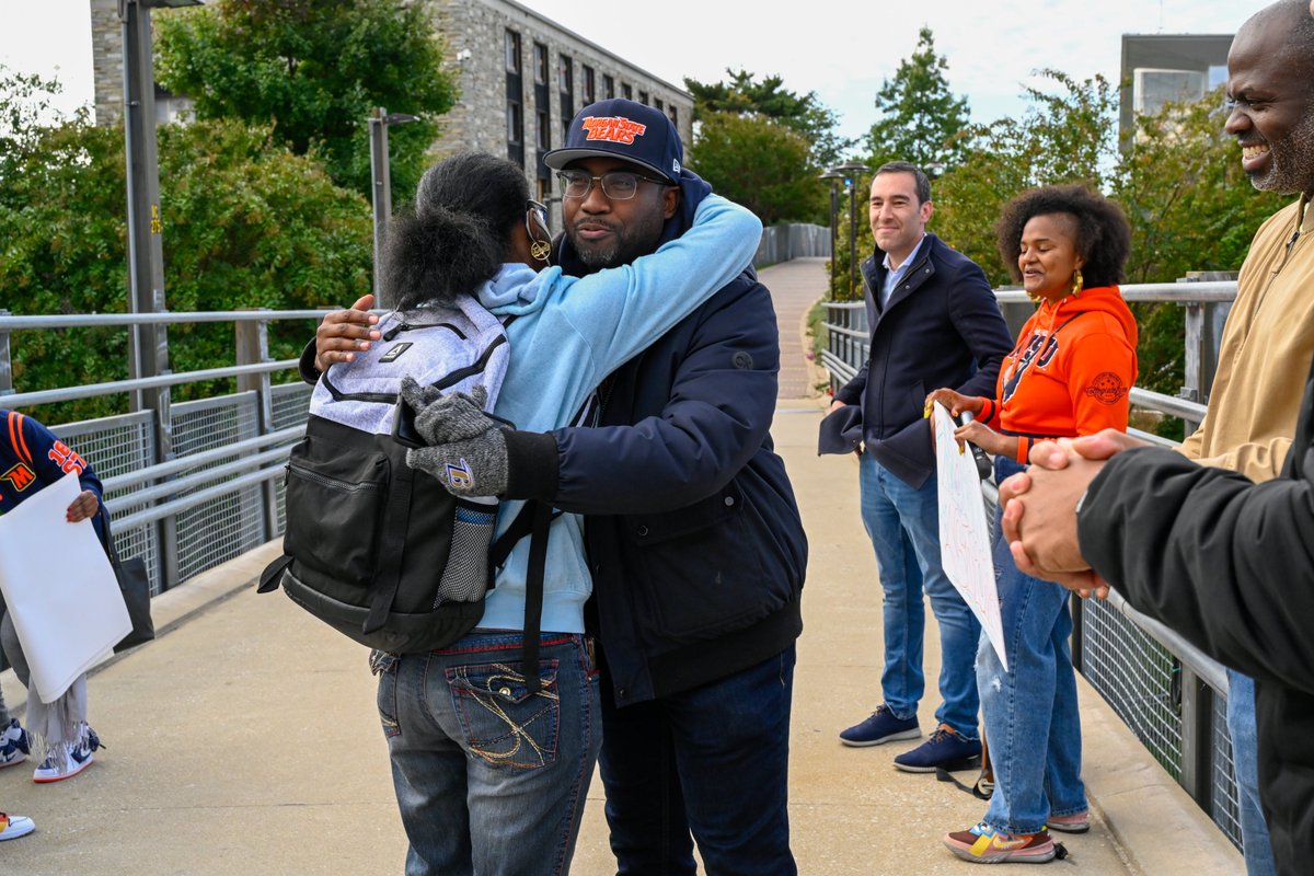 Warm hugs to start the week. Alumni, friends, and faculty gathered on the Welcome Bridge to greet our students returning to class. Thank you for the support and comfort at the National Treasure. #MorganStrong